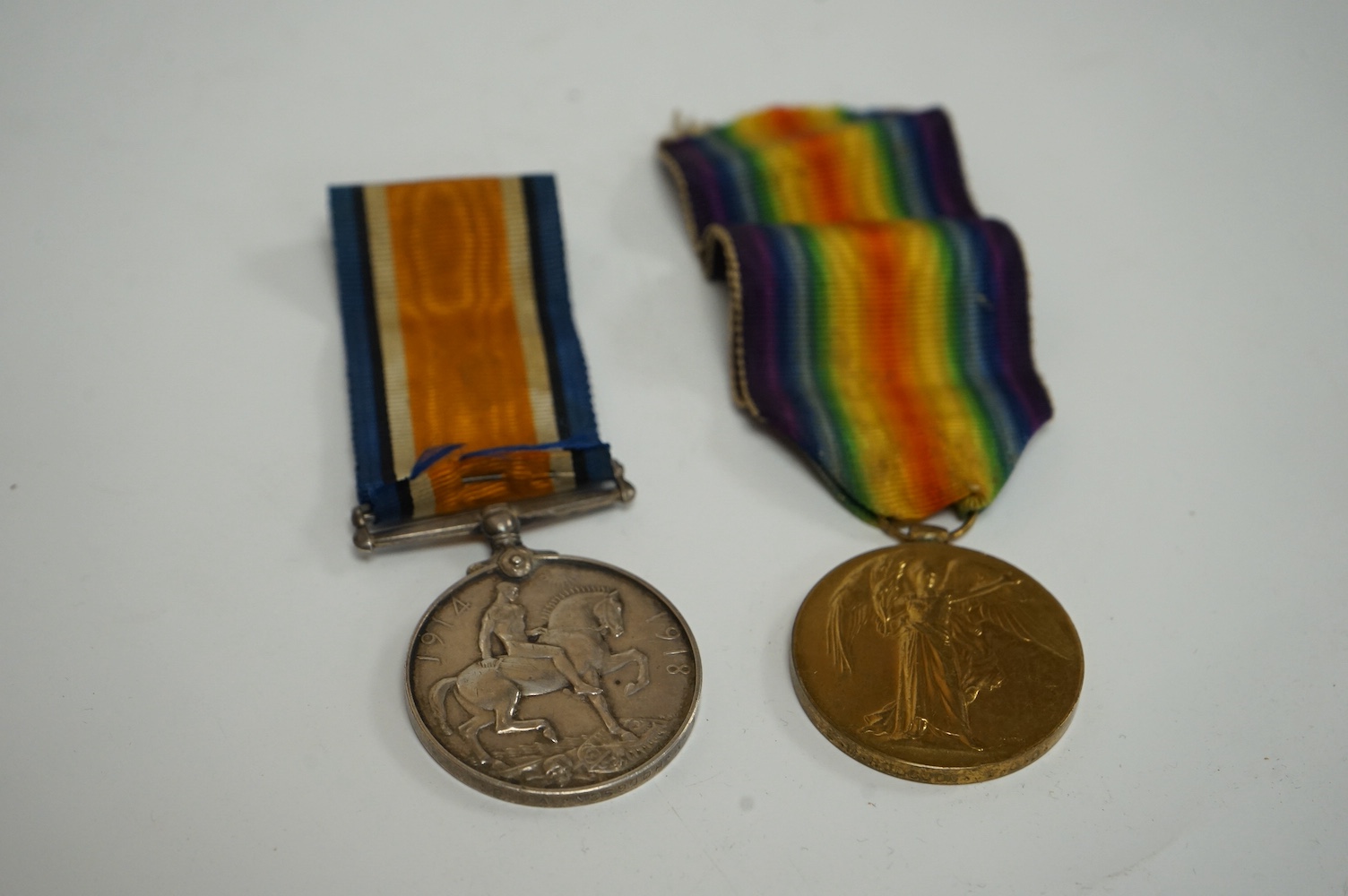 WWI interest - a War Medal and Victory Medal pair for E. M. HODGSON. V. A. D., Condition - fair.